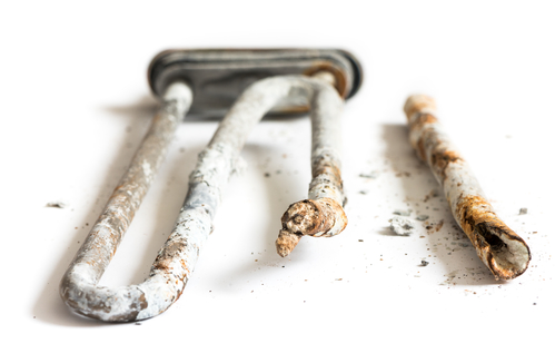 Damaged Heating Element of the Washing Machine Damage to heating element caused by hard water
